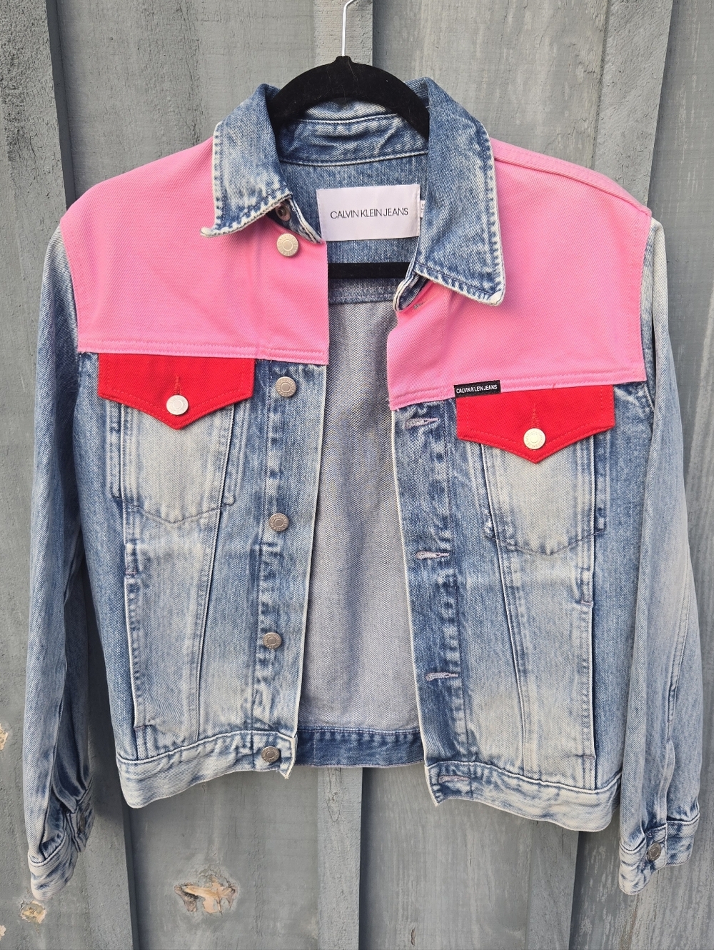 Calvin Klein Denim Jacket with Pink and Red Accents